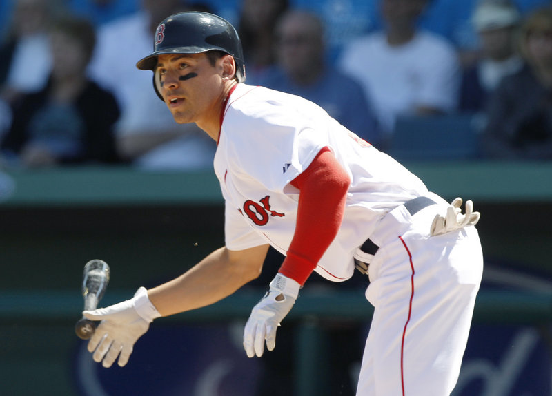 Boston’s Jacoby Ellsbury hits a two-RBI double against the Marlins during the second inning of a spring training game Saturday in Fort Myers, Fla. Ellsbury went 3 for 3 with his first homer of the spring. Boston won, 9-2.