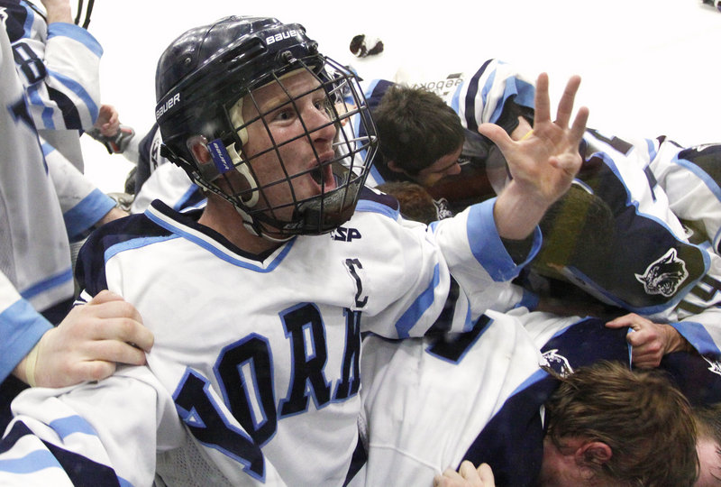 Anthony Figlioli of York had a lot to celebrate Saturday. After all, how many times does a player get to score the overtime goal that gives his team the Class B state championship? Figlioli did it in a 4-3 victory against previously undefeated Brewer in Lewiston.