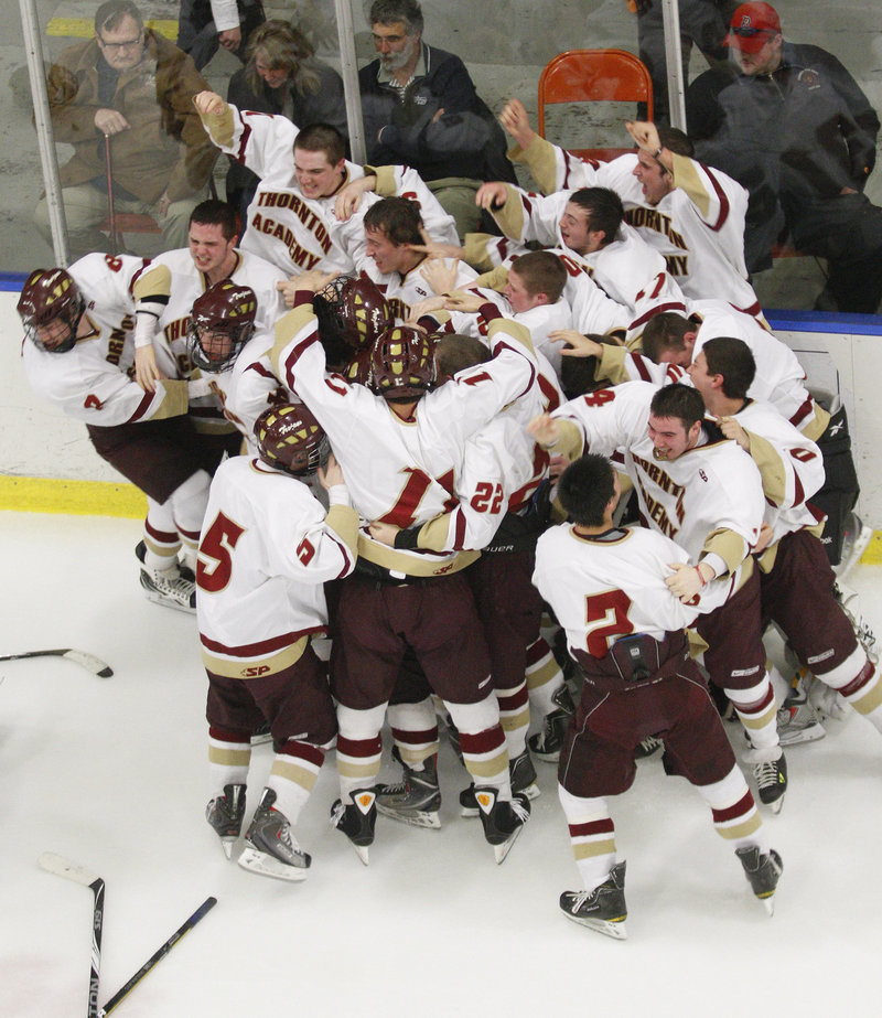 The first state hockey title in school history won, the Thornton Academy players had their never-to-be-forgotten moment Saturday night after beating Lewiston in two OTs.
