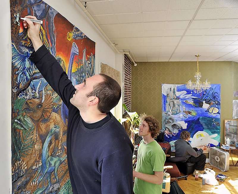 Eric Giddings, in a Portland apartment with his friends, Ben Braley and Zach Nedwell, developed an interest in art while in school at South Portland, even as he became one of the state’s best runners.