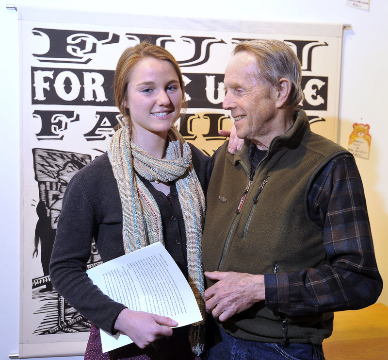 Ali Perkins with her grandfather, Dave Getchell, before reading her winning essay.