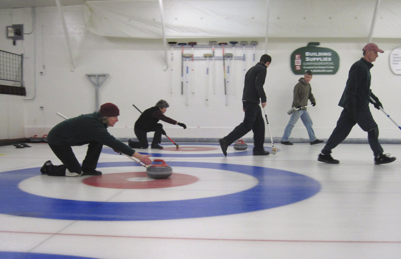 Teams play on side-by-side sheets at the home of the Belfast Curling Club, Maine’s only curling clubhouse.