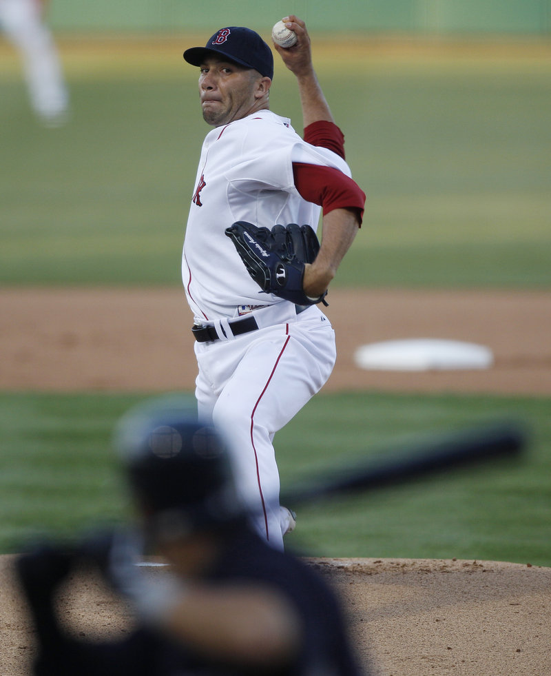 Alfredo Aceves, now with the Red Sox after pitching for the Yankees, was the starter in Boston’s 2-1 victory.