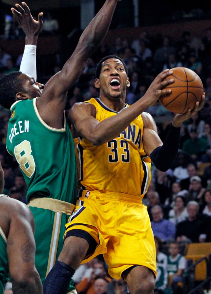 Danny Granger of the Indiana Pacers tries to find a way around Jeff Green, who scored 19 points off the bench Wednesday night for the Boston Celtics in a 92-80 victory.