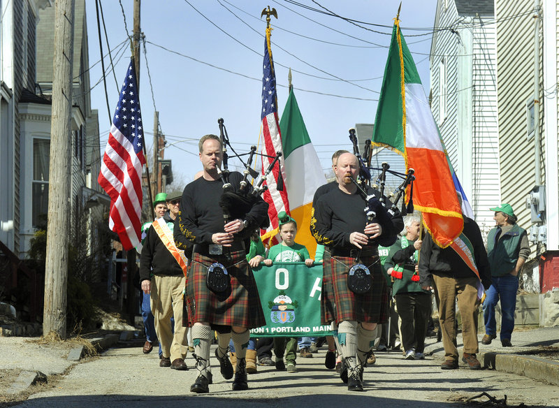 Portland celebrated St. Patrick's Day as the Claddagh Mhor Pipe Band led a parade from the Maine Irish Heritage Center to Harbor View Memorial Park, where members of the Ancient Order of Hibernians and the Irish American Club of Maine raised the U.S. and Irish flags.