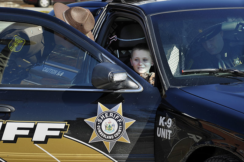 Cameron arrives in a K-9 cruiser to a special reception by the Sheriff’s Department in Portland. Cameron hopes to join a police force some day, said his mother, Rhiannon Tufts.