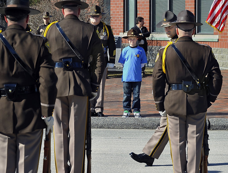 Cameron stands at attention during the military inspection Thursday, held as part of his Make-a-Wish gift.