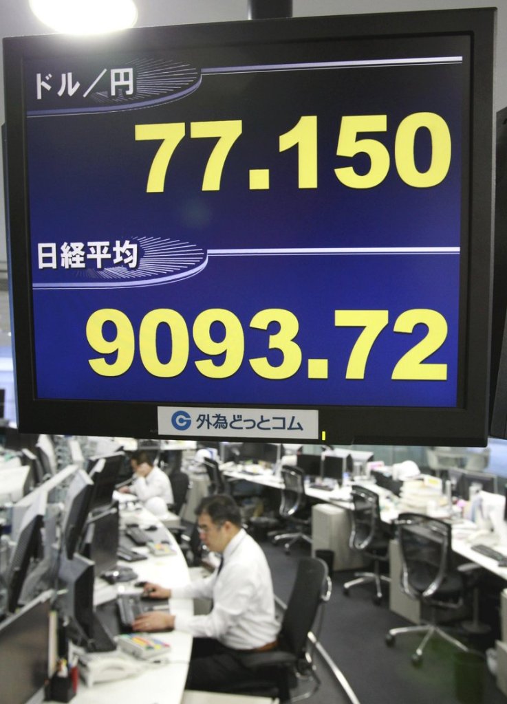 The conversion rate of the U.S. dollar against the Japanese yen is shown on a monitor Thursday in Tokyo.
