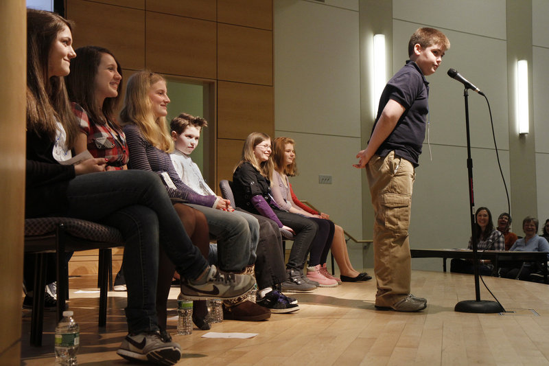 Medomak Middle School seventh-grader Jackson Vail listens carefully to his word during the Maine State Spelling Bee at University of Southern Maine’s Hannaford Hall in Portland on Saturday. He lasted until round 12, when he was stumped by the word “geoponics.”