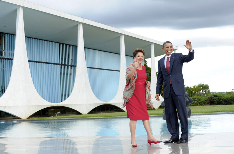 President Obama walks with Brazilian President Dilma Vana Rousseff outside the Palacio do Alvorada in Brasilia on Saturday. Obama told business leaders his trip is “a jobs strategy.”