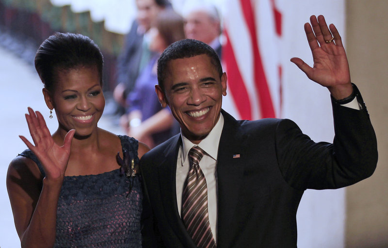 President Obama and first lady Michelle Obama wave Monday after arriving at the La Moneda Cultural Center in Santiago, Chile. The president emphasized the importance of trade ties between the United States and Latin America.