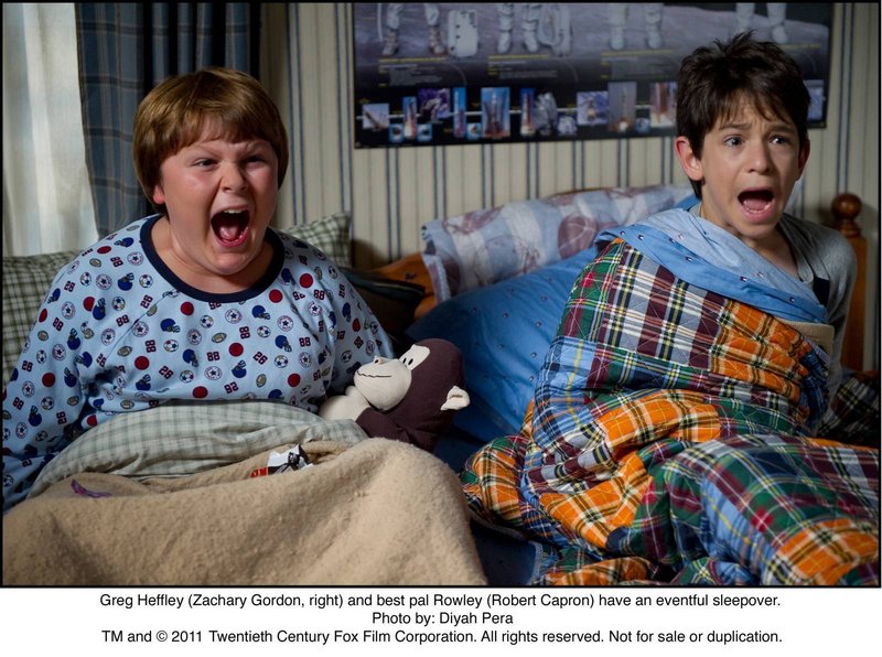 Greg Heffley (Zachary Gordon, right) and best pal Rowley (Robert Capron) have an eventful sleepover in “Diary of a Wimpy Kid: Rodrick Rules.”
