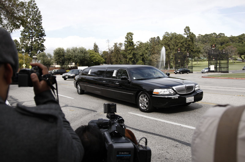 Five limousines carried Elizabeth Taylor's family to her services Thursday at Forest Lawn cemetery in Glendale, Calif., the final resting place for many celebrities, including Michael Jackson.