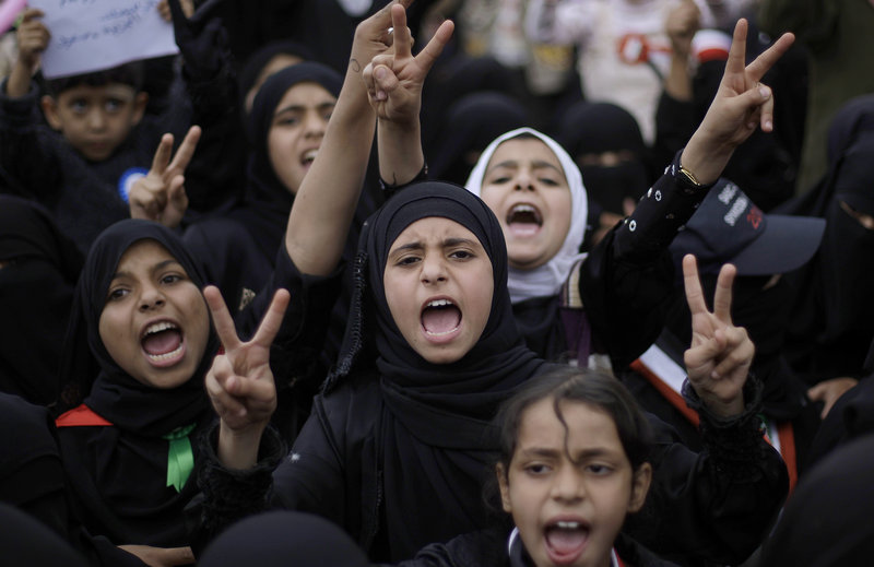 Yemeni girls shout slogans during a demonstration demanding the resignation of Yemeni President Ali Abdullah Saleh, in San'a, Yemen, on Saturday.