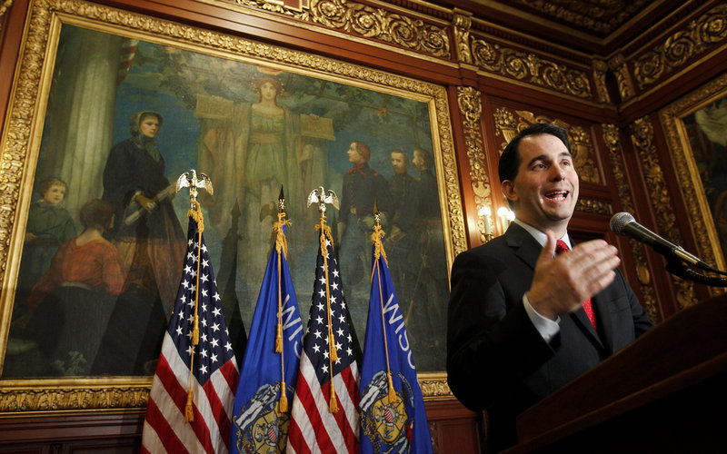 New Republican Gov. Scott Walker succeeded in having a law passed that nearly eliminates Wisconsin public employees’ bargaining rights.