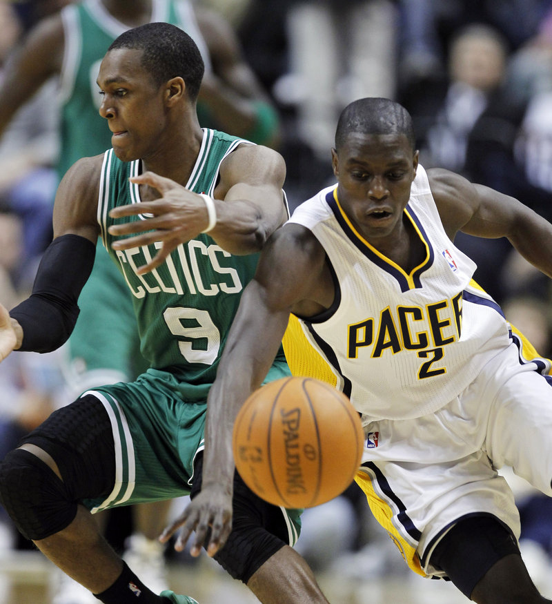 Darren Collison of the Pacers steals the ball from Boston guard Rajon Rondo in the second half of Indiana’s 107-100 win Monday night in Indianapolis. Collison had 18 points and a pair of late buckets to keep the Pacers ahead.