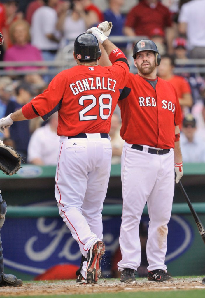 It s a sight Red Sox fans hope to see a lot this year – Adrian Gonzalez congratulated by Kevin Youkilis after a home run. Gonzalez congratulating Youkilis is also good.