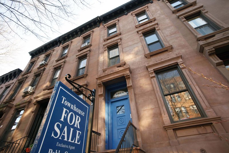 A townhouse for sale in Brooklyn, N.Y. Housing prices fell in 19 of 20 large cities and 0.22 percent overall in January, according to the S&P/Case-Shiller index released Tueday. Washington was the only city in which prices rose.