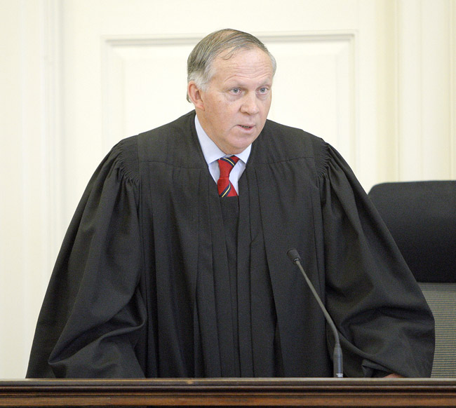 Justice G. Arthur Brennan instructs jurors in York County Superior Court in Alfred today. The jurors are deadlocked on some of the charges against Gary Traynham, who triggered the state's first Amber Alert after he took his 2-year-old daughter after a dispute with his former girlfriend.