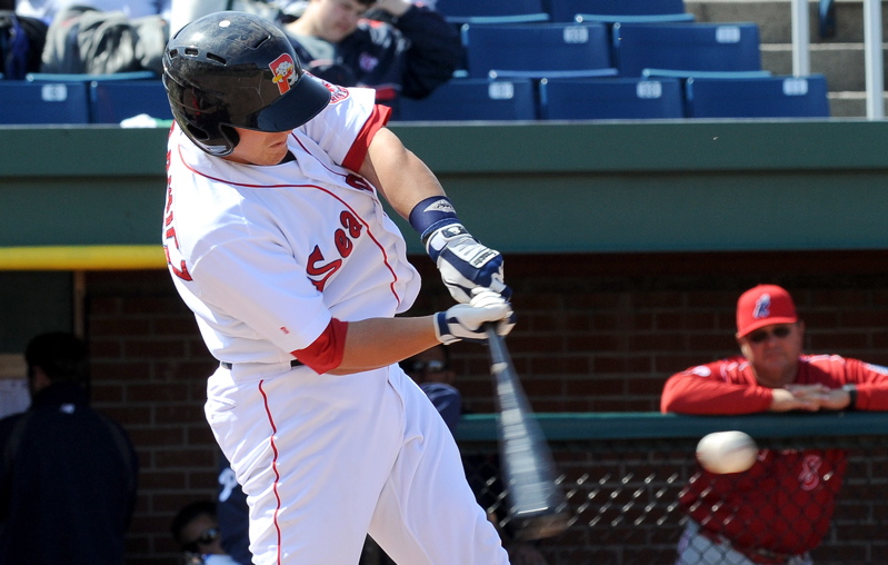 Tim Federowicz of the Sea Dogs hits a single in today's game against the Reading Phillies at Hadlock Field. Reading won, 13-5.