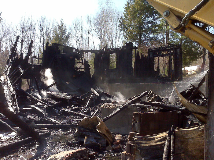 Scenes of this morning's fire at 254 Highland Park Road in Fryeburg.