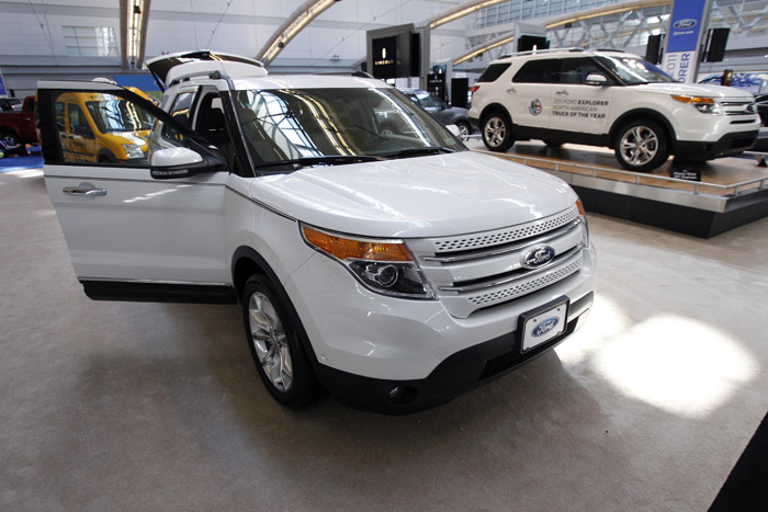 Ford Motor Co. says it earned $2.6 billion in the first quarter, helped by vehicles like the 2011 Explorer, shown here at the Pittsburgh International Auto Show in February.