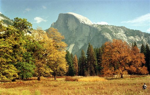 A view of Half Dome from the valley floor of Yosemite National Park is shown in this Oct. 20, 1997 file photo, in Yosemite, Calif. If lawmakers can't reach an agreement by midnight Friday, April 8, 2011 the Smithsonian and its collection of museums in Washington would close as would Yosemite park in California and other National Parks across the country at a key time for many of the tourist destinations.