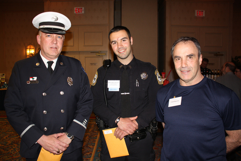 Lt. Aaron Osgood of the Portland Fire Department and Officer Rocco Navarro of the South Portland Police Department, with Frank Navarro, Rocco’s dad and a member of the Portland Fire Department.
