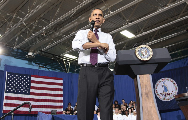 President Obama rolls up his sleeves Tuesday during a town hall meeting in Annandale, Va., to discuss reducing the national debt. With Standard and Poor's debt warning in mind, politicians should cease adversarial posturing and work to ensure the nation's long-term fiscal health.