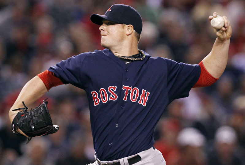 Boston Red Sox pitcher Jon Lester delivers against the Los Angeles Angels Friday night in Anaheim, Calif.
