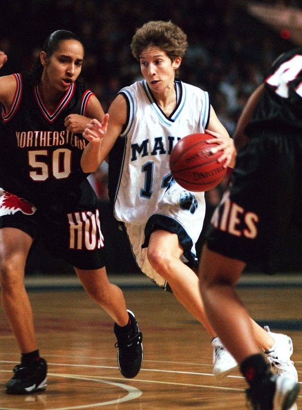 Cindy Blodgett shows her art in a drive for the basket in her glory days at the University of Maine.