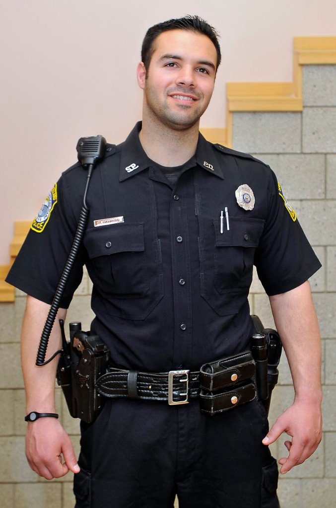 South Portland police Officer Rocco Navarro models his utility belt. Gone are the days when officers simply carried a service revolver, night stick and handcuffs.