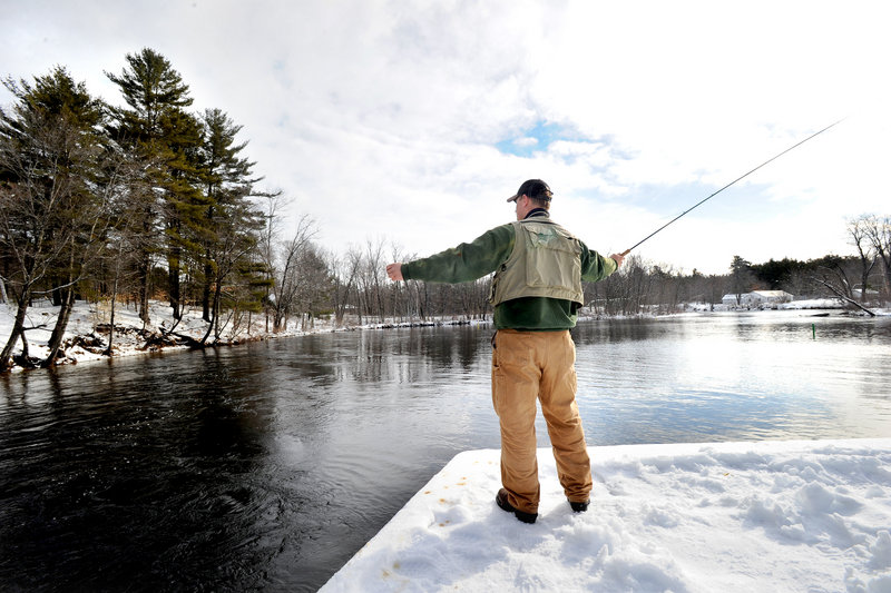 Grant Gushee of Bridgton casts a fly at the Songo Locks in Naples. When the state’s rules changed last year to allow widespread year-round fishing, some anglers mistakenly thought it was only temporary.