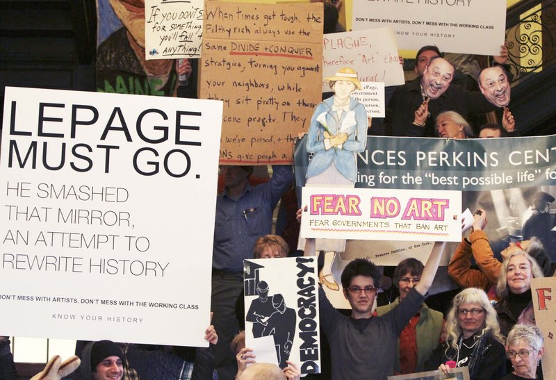 Pro-labor demonstrators gather April 4 at the State House to protest Gov. LePage’s policies, including the removal of a mural depicting the history of labor from the Labor Department.