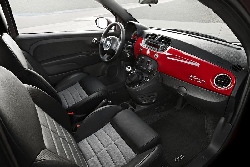 The interior of the Fiat 500 is well-equipped. It includes a Bose audio system with hands-free cellphone link, power windows, split folding rear seatbacks and a leather-wrapped steering wheel.