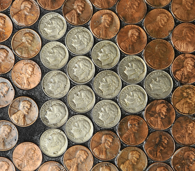 Edwards’ kitchen floor is mostly made of pennies – about 31,000 of them – but she added a few dimes here and there for interest.