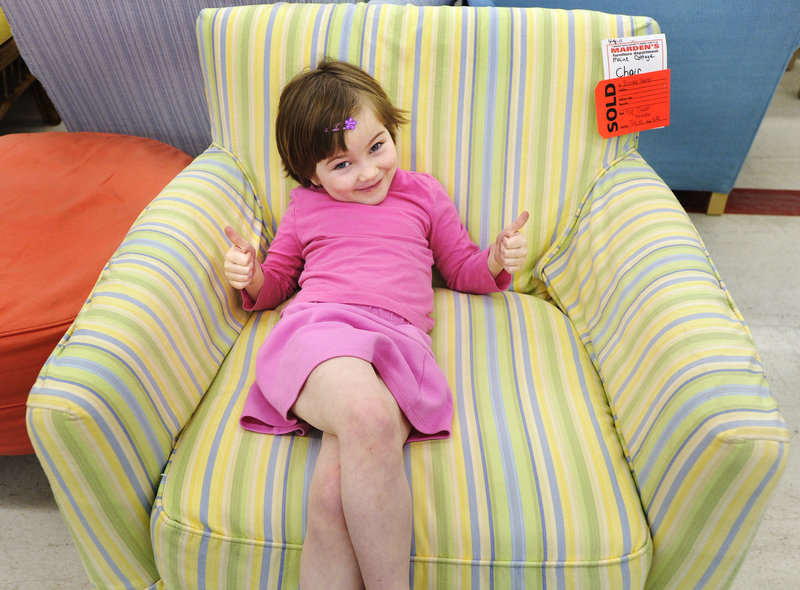 Lillian Hanley, 5, was pretty excited about the chair that her mother, Bethany, purchased there.