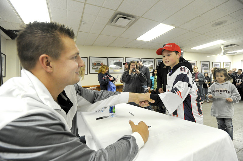 Rob Gronkowski of the New England Patriots spent an hour and a half greeting fans Tuesday night at Hadlock Field, including 9-year-old Trafton Gilbert of Waterville and his sister, Raylee, 6.