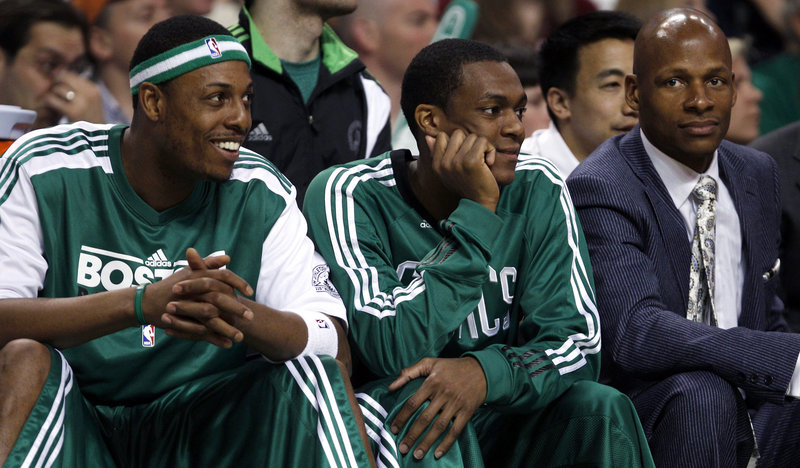 It was a night of rest Wednesday for Paul Pierce, left, and Rajon Rondo of the Boston Celtics as they watched their teammates beat the New York Knicks, 112-102. Enjoy it now. The playoffs start Sunday against the Knicks.