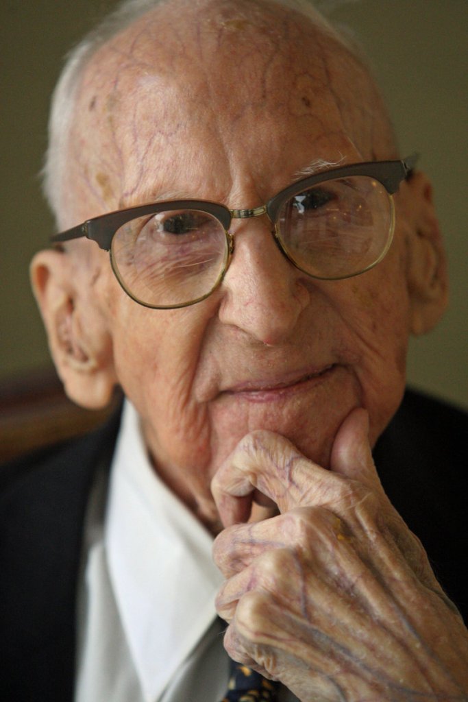 Walter Breuning, shown during an interview last October in Great Falls, Mont., was the world's oldest man, 26 days younger than the world's oldest person, a 114-year-old Georgia woman.