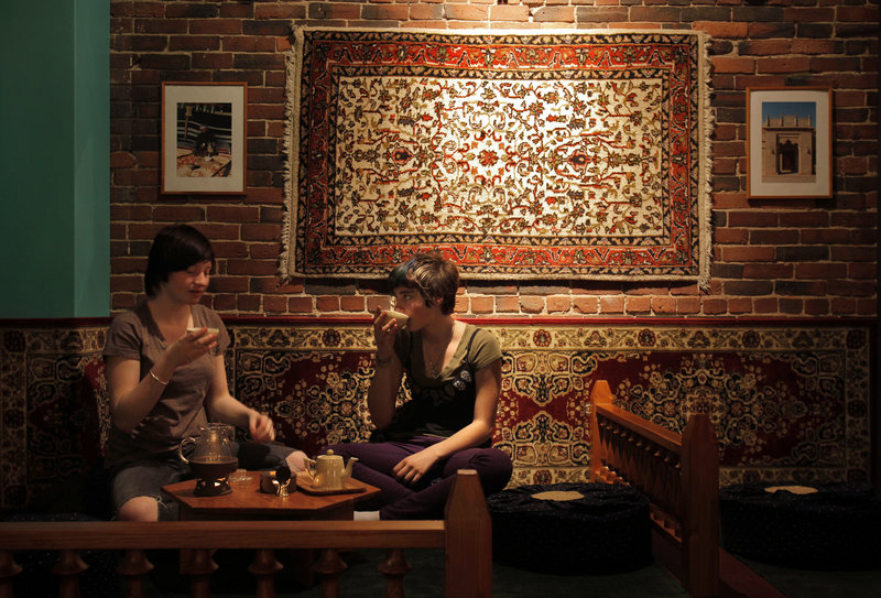 Mackenzie Lewis, left, and Chiara Morabito enjoy the tea at Dobra Tea.