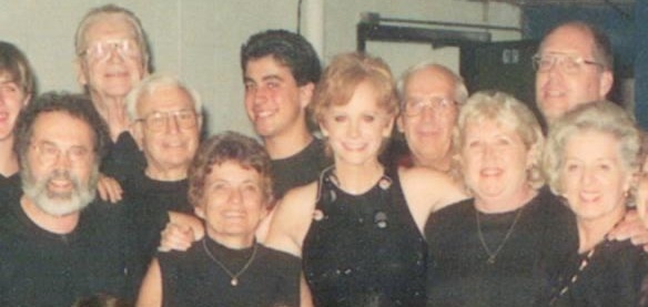 Country singer Reba McEntire is shown with members of the Gorham First Parish Congregational Church choir, including Babara Neal, to the left of McEntire, in a photo dated 1998. Paul Neal is to the left rear of his wife.