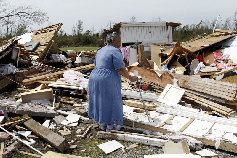 June White views Moore’s Family Care Home in Colerain, N.C., after a tornado ripped through the area.