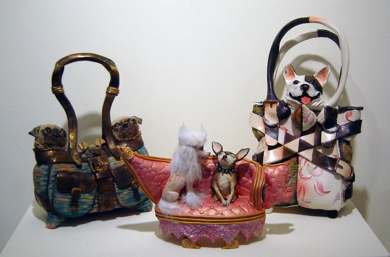 In the “Critters” exhibition at the Art Gallery at the University of New England in Portland: ceramic teapots by Meryl Ruth.