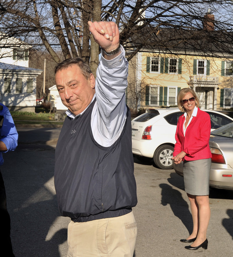 Gov. Paul LePage waves goodbye to clients and staff of Tedford Housing, a shelter for homeless families in Brunswick, on Friday.