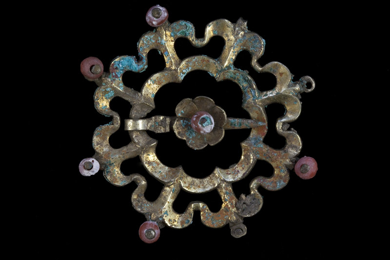 This brooch was among more than 200 pieces of jewelry and other precious objects found in a backyard in Wiener Neustadt, Austria. Their value has not been determined.