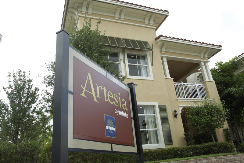 Houses are for sale in the new Artesia development in Sunrise, Fla. More people bought new homes in March, giving the battered industry a small lift after the worst winter for sales in almost 50 years.