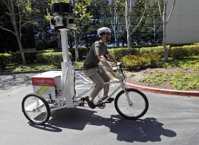 Daniel Ratner, a mechanical engineer, demonstrates the StreetView Trike used by Google for street mapping. Ratner built the prototype in a machine shop created for employees.
