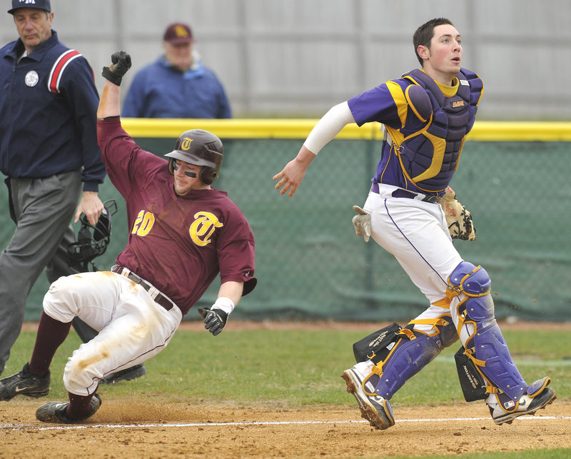 Fred Randall of Thornton Academy crosses the plate as Cheverus catcher Nic Lops prepares to grab the late throw in the second inning.