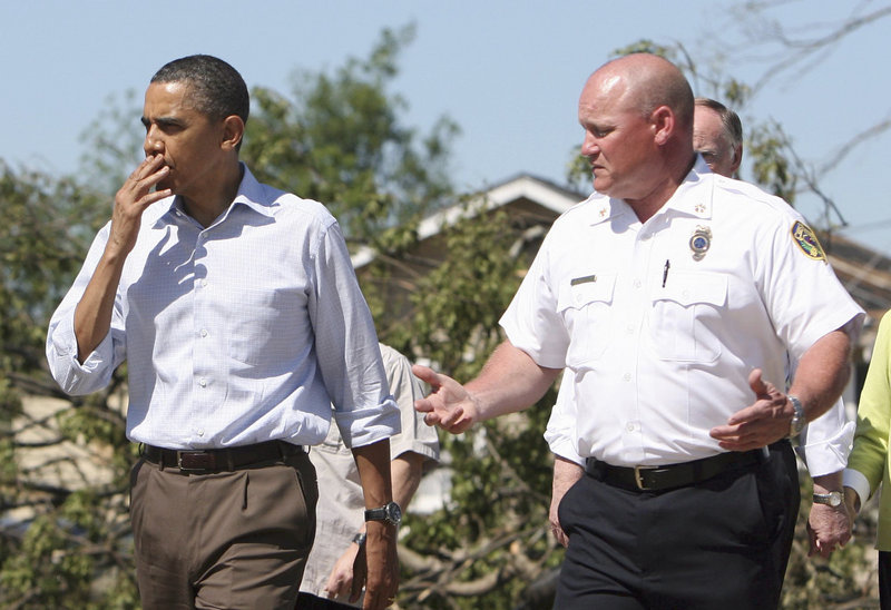 President Obama and fire official Kevin Burgess tour a tornado-ravaged neighborhood Friday in Tuscaloosa, Ala. “I’ve never seen devastation like this,” Obama said. Emergency management officials confirmed 238 deaths in Alabama in the wake of the storms.